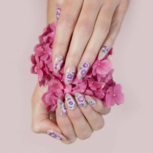 Nail art pink and purple flowers